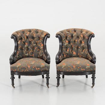 A pair of late 19th century lounge chairs.