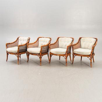 A set of four imitated bamboo and rattan easy chairs later part of the 20th century.