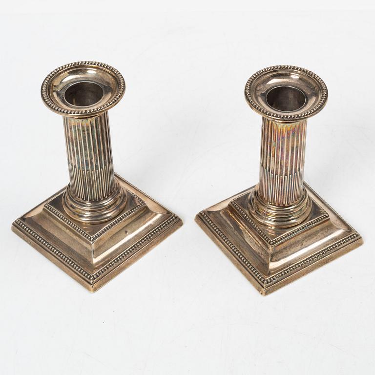 Hawksworth, Eyre & Co Ltd, a pair of silver candlesticks, Sheffield 1890.