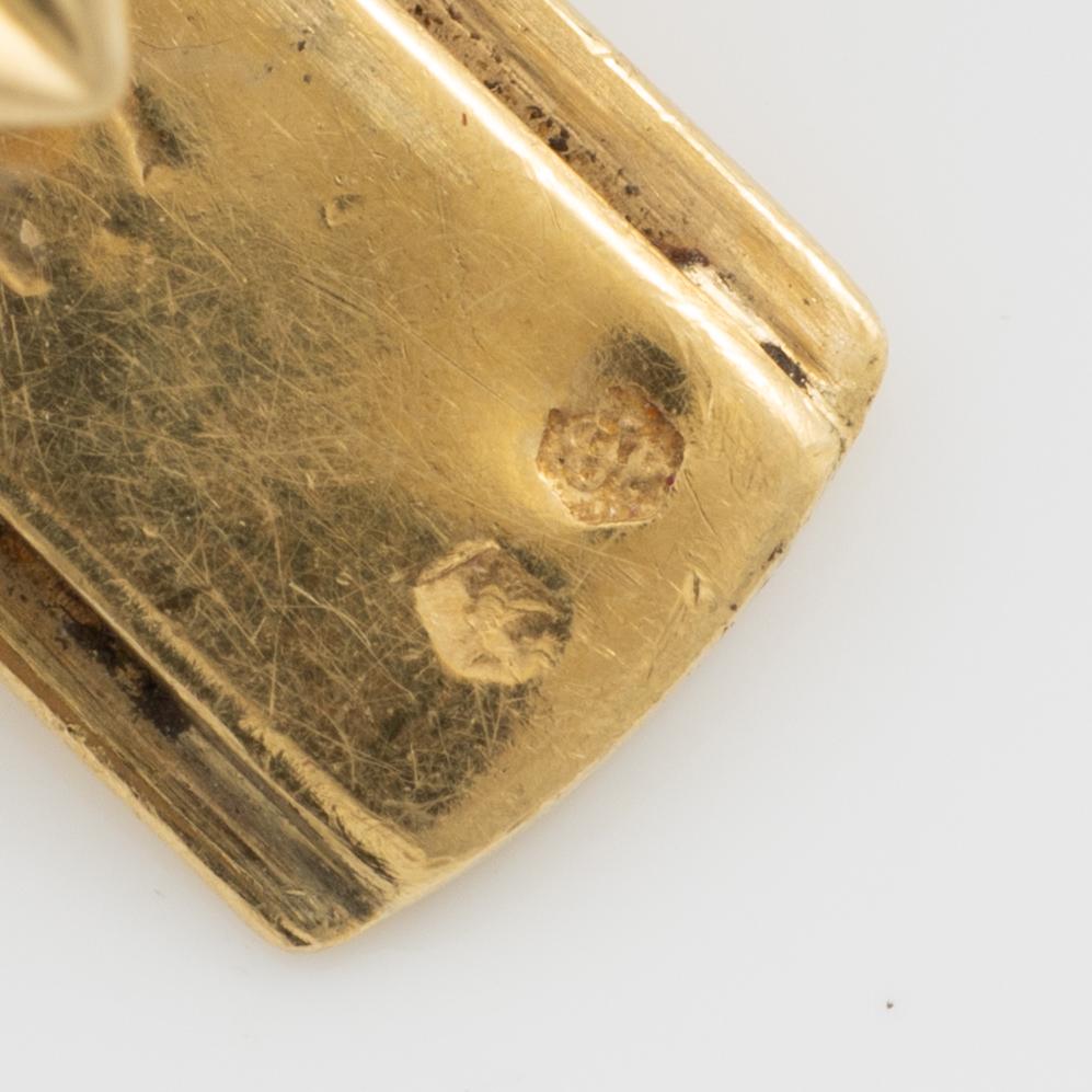 Bracelet 18K gold with diamonds and rubies.