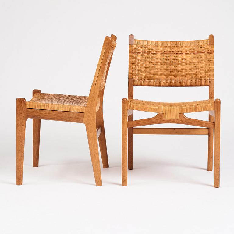 Hans J. Wegner, a set of 10 oak and rattan 'CH31' chairs, Carl Hansen & Son, Denmark 1950s.