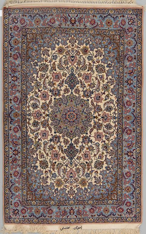 A rug from Esfahan, signed, around 160 x 103 cm.