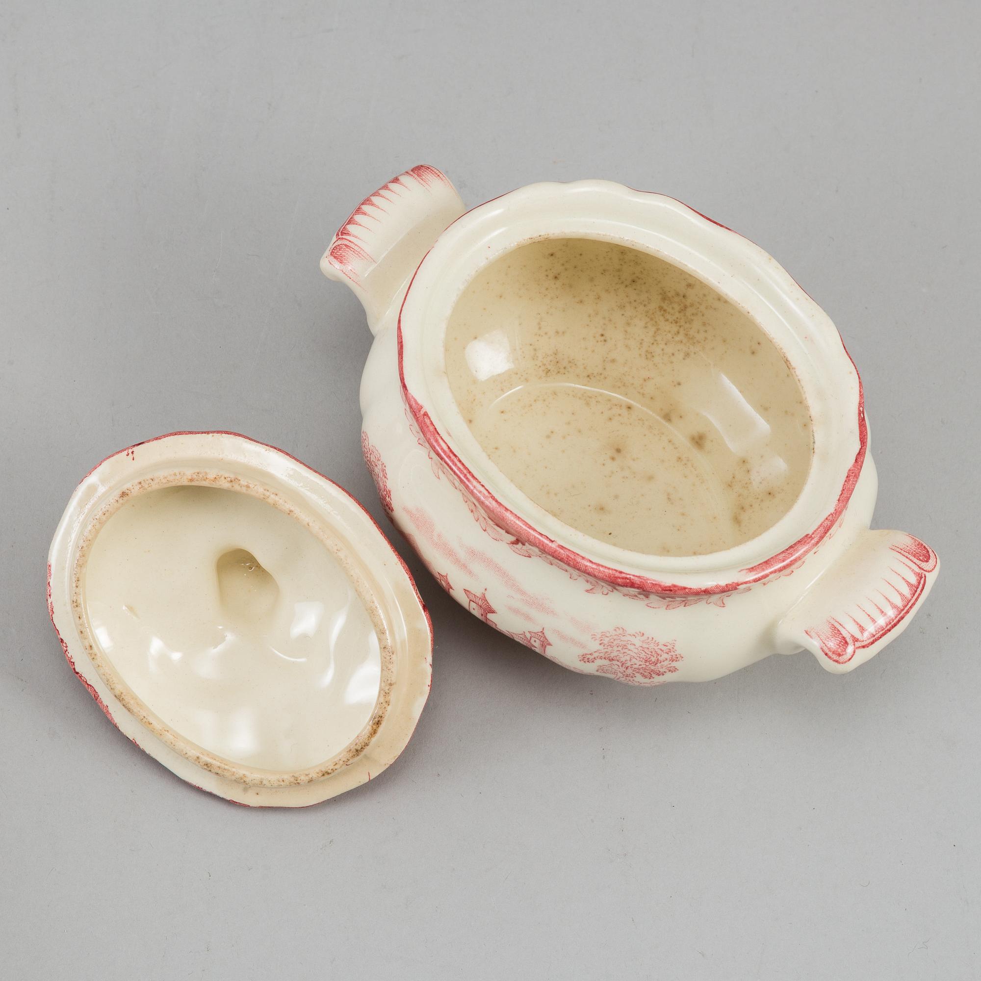 A part red 'Bengali' creamware dinner service, Rörstrand, 1948-56 (111 pieces).