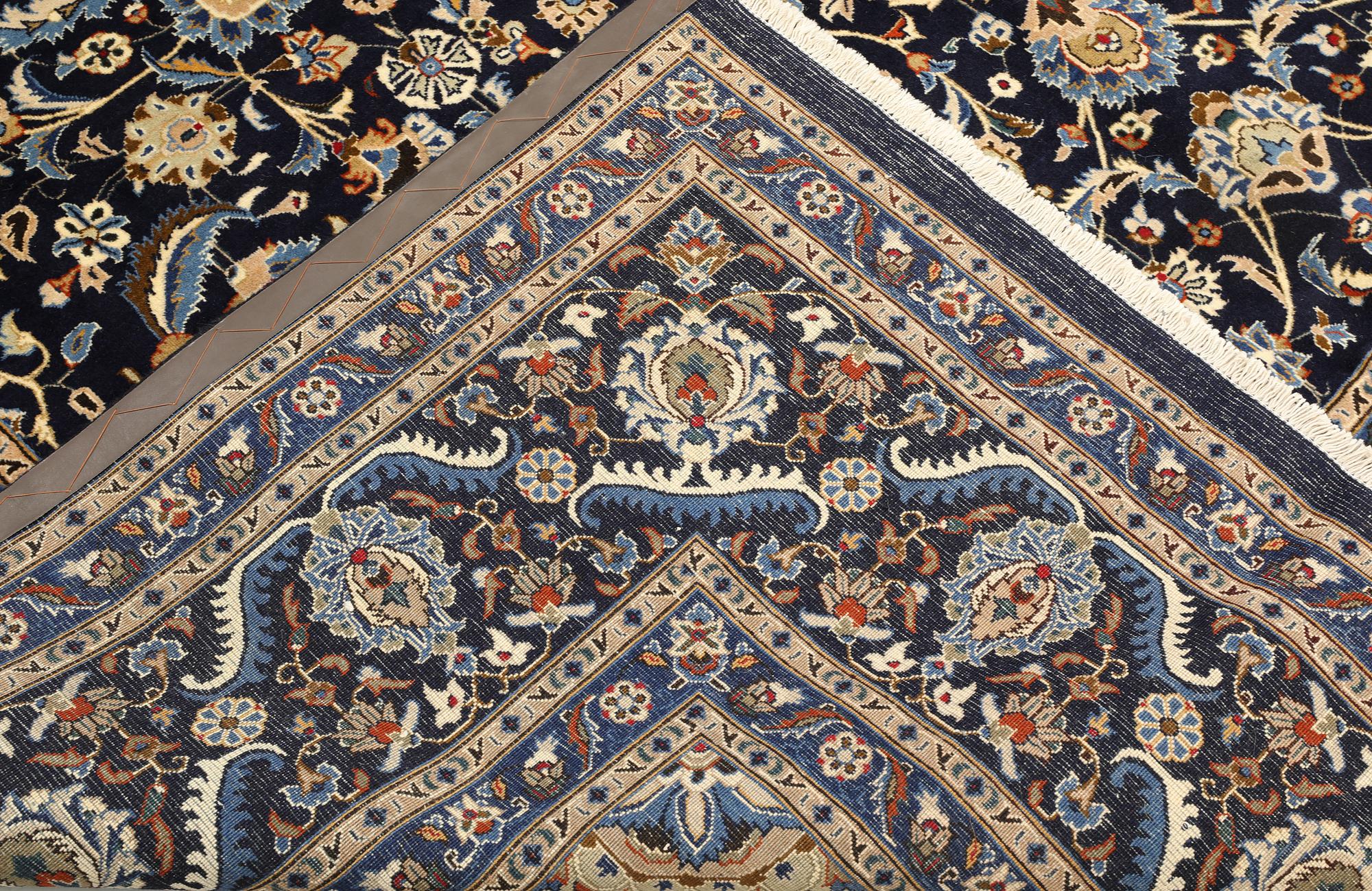 A Keshan carpet, approx. 400 x 295 cm.