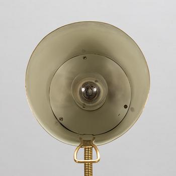 A mid-20th century floor lamp.