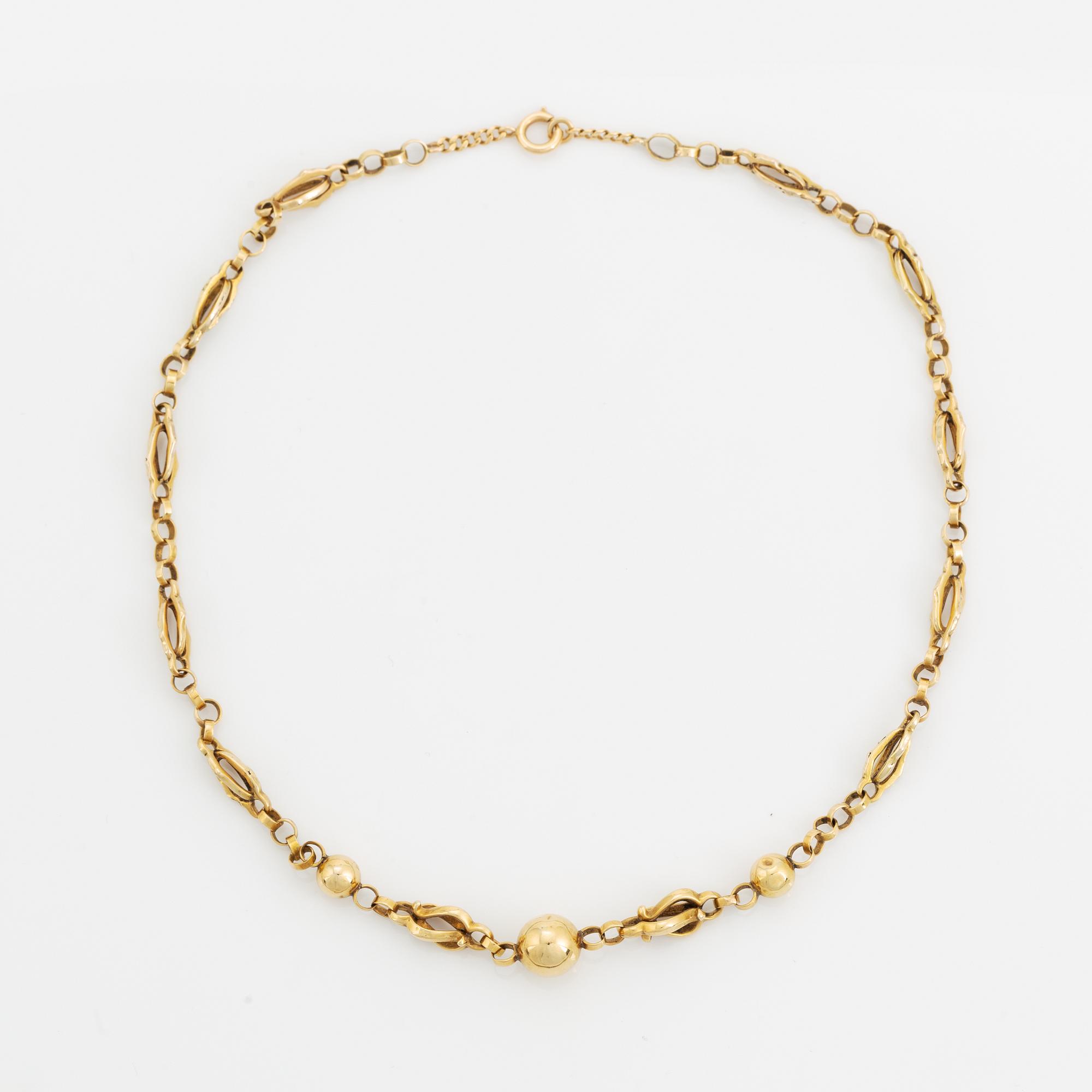 18K gold necklace.