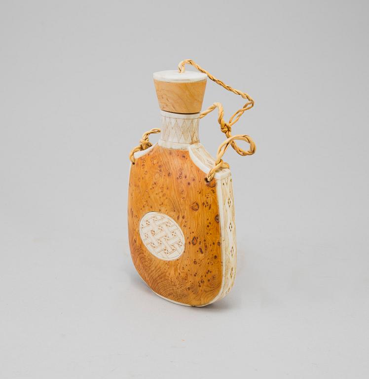 A Sami knife and bottle, Knut Dahlgren, Arvidsjaur, signed KD, second half of the 20th Century.