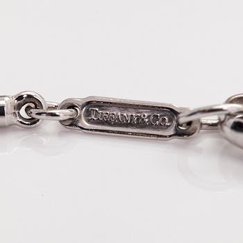 Tiffany & Co, a 18K white gold 'Atlas Bar' necklace with diamonds ca 0.06 ct.