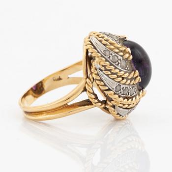 Cabochon cut amethyst and rose cut diamond ring.