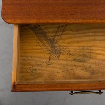 A pair of bedside tables, probably 1950s.