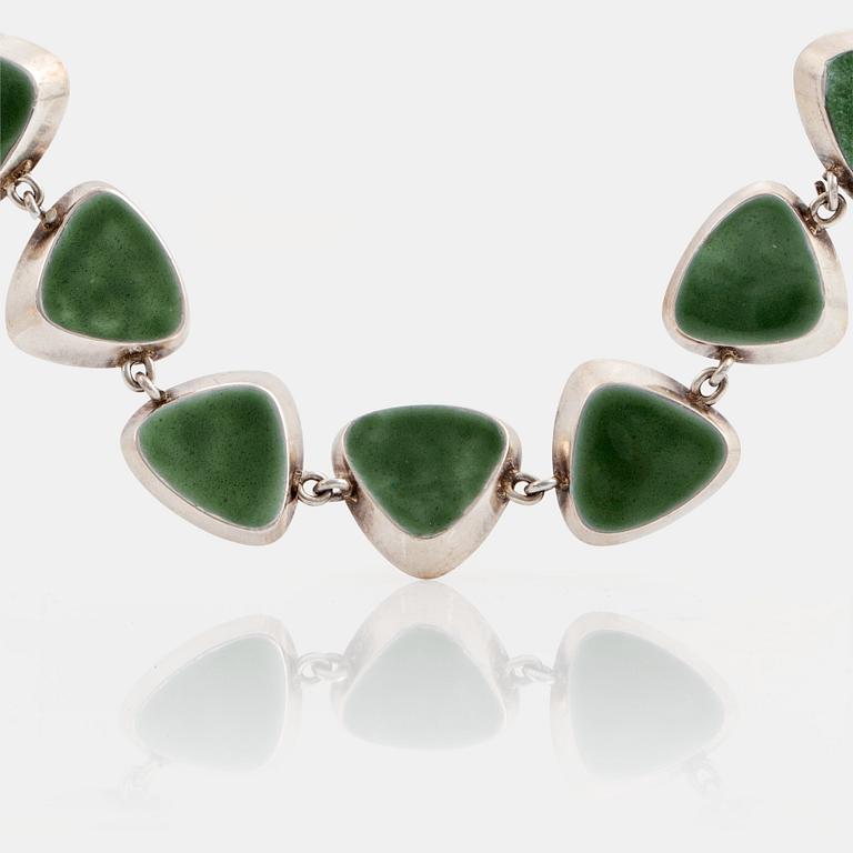 A WA Bolin silver bracelet with green enamel.