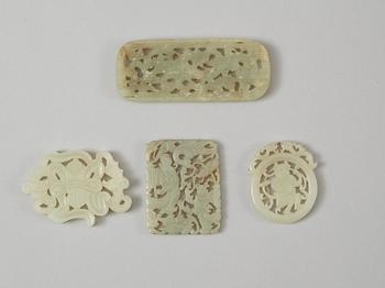 A set of four Chinese nephrite plaques.