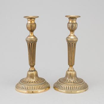 A pair of late 18th century Gustavian bronze candlesticks.