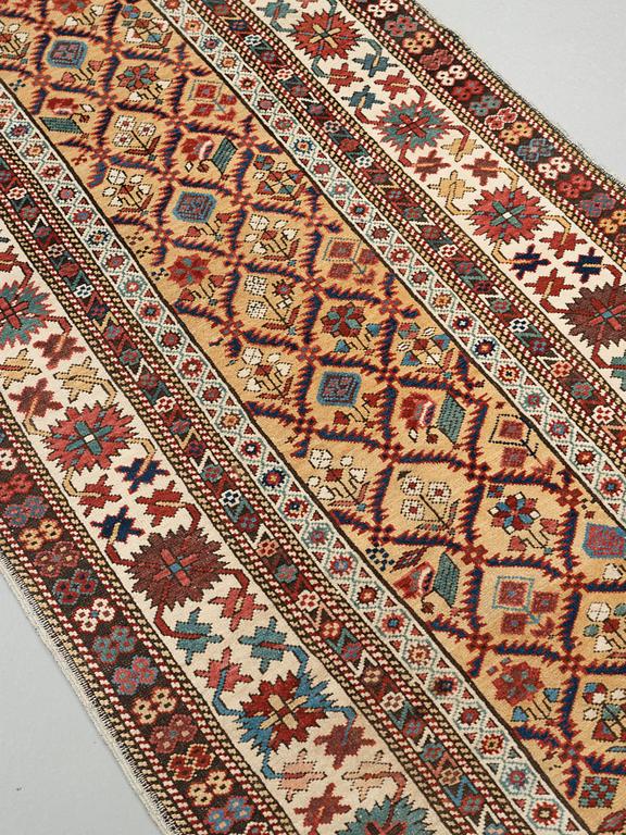 MATTO, an antique Kuba, ca 289,5 x 97 cm (as well as the ends with 1 cm light blue soumak).