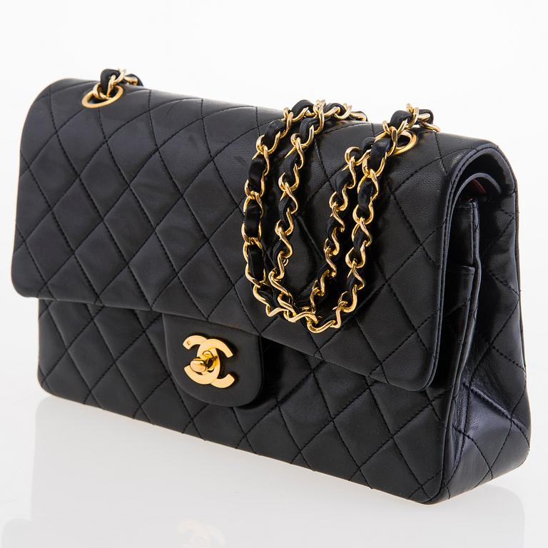 CHANEL Black Double Flap Bag.