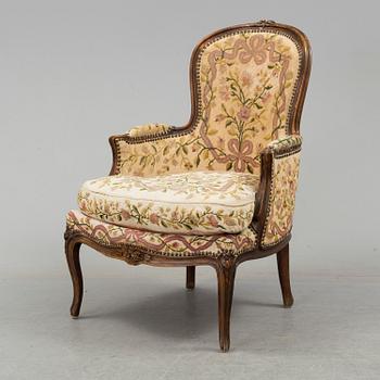 An end of the 19th century Louis XV style oak bergere.