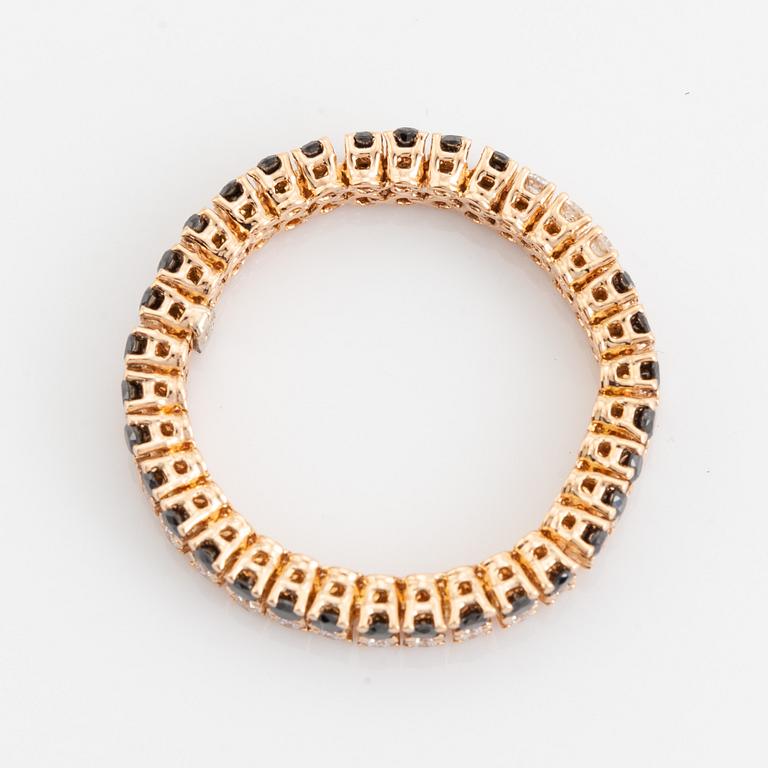Black and colourless diamond ring.