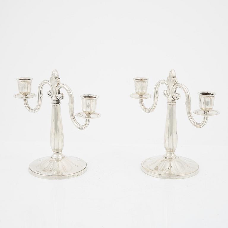 A pair of Swedish silver candelabra, mark of GAB, Stockholm 1931.