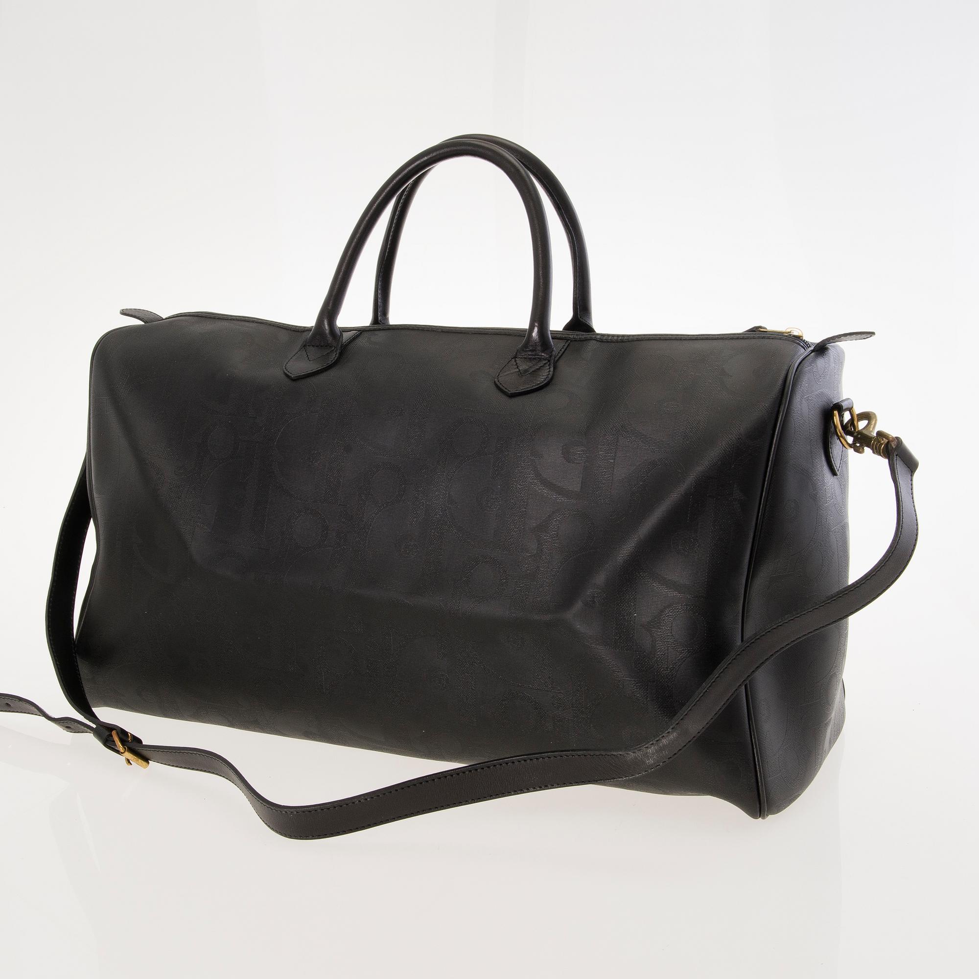 CHRISTIAN DIOR Black Monogram Coated Canvas Duffel Bag.