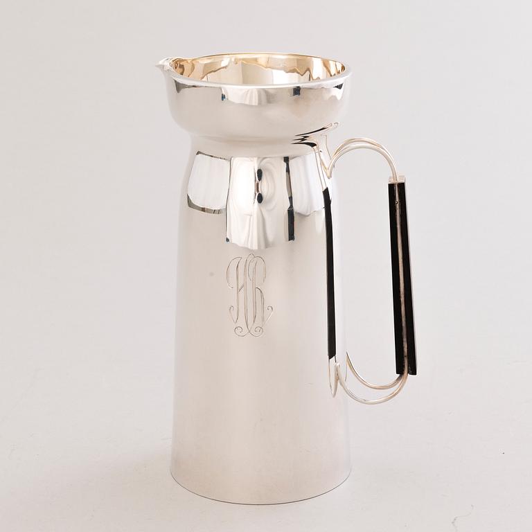 A 1960s silver jug with hardwood handle, Kultateollisuus, Turku Finland 1968.