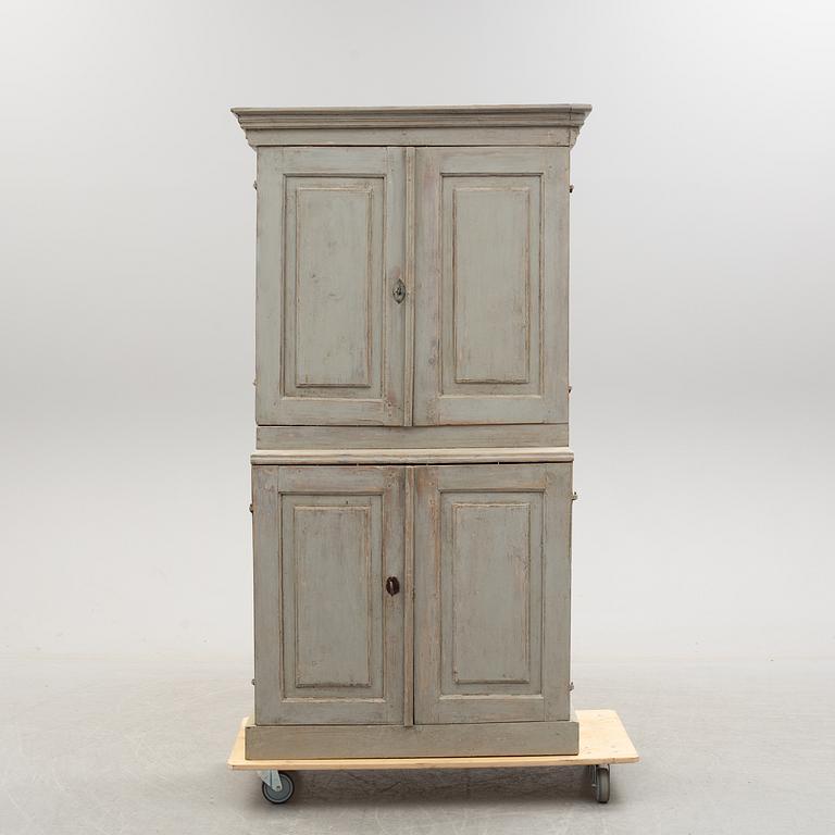 A first half of the 19th century painted cabinet.