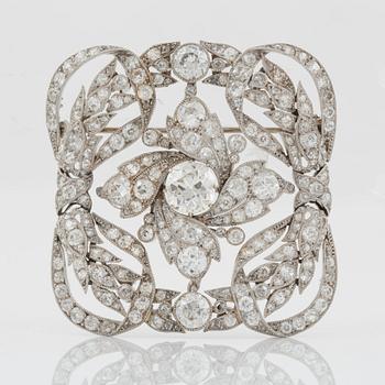 1128. A large old-cut diamond brooch, probably made by Cartier. Made in France in 1910 according to hallmarks.
