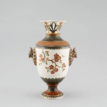 A majolica vase, a flower pot and a jardiniere from Rörstrand, around the year 1900.