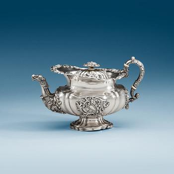 903. A Russian 19th century parcel-gilt tea-jug, makers mark of Alexander Korder, St. Petersburg 1840.