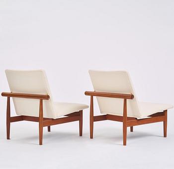 Finn Juhl, a pair of 'Japan' (FD-137) easy chairs and an ottoman, France & Son, Denmark, 1960s.