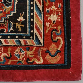 MATTO, A MEDITATION RUG, semi-antique Tibetan, ca ca 63,5-64,5 x 68,5-70 cm (as well as 5 cm fabric at the sides.