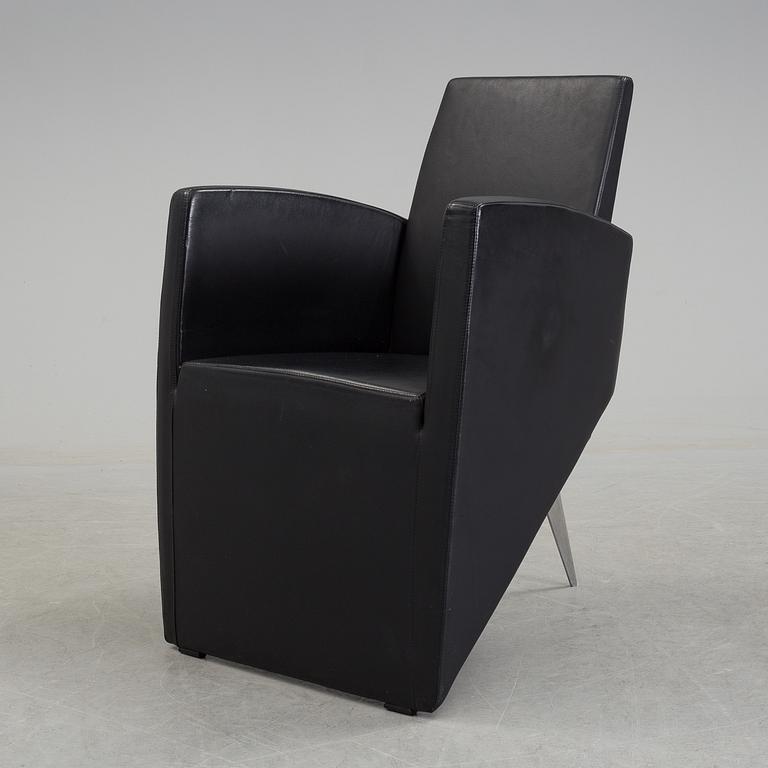 A Philippe Starck 'J Serie Lang' black leather and cast aluminium lounge chair, by Aleph, Italy.