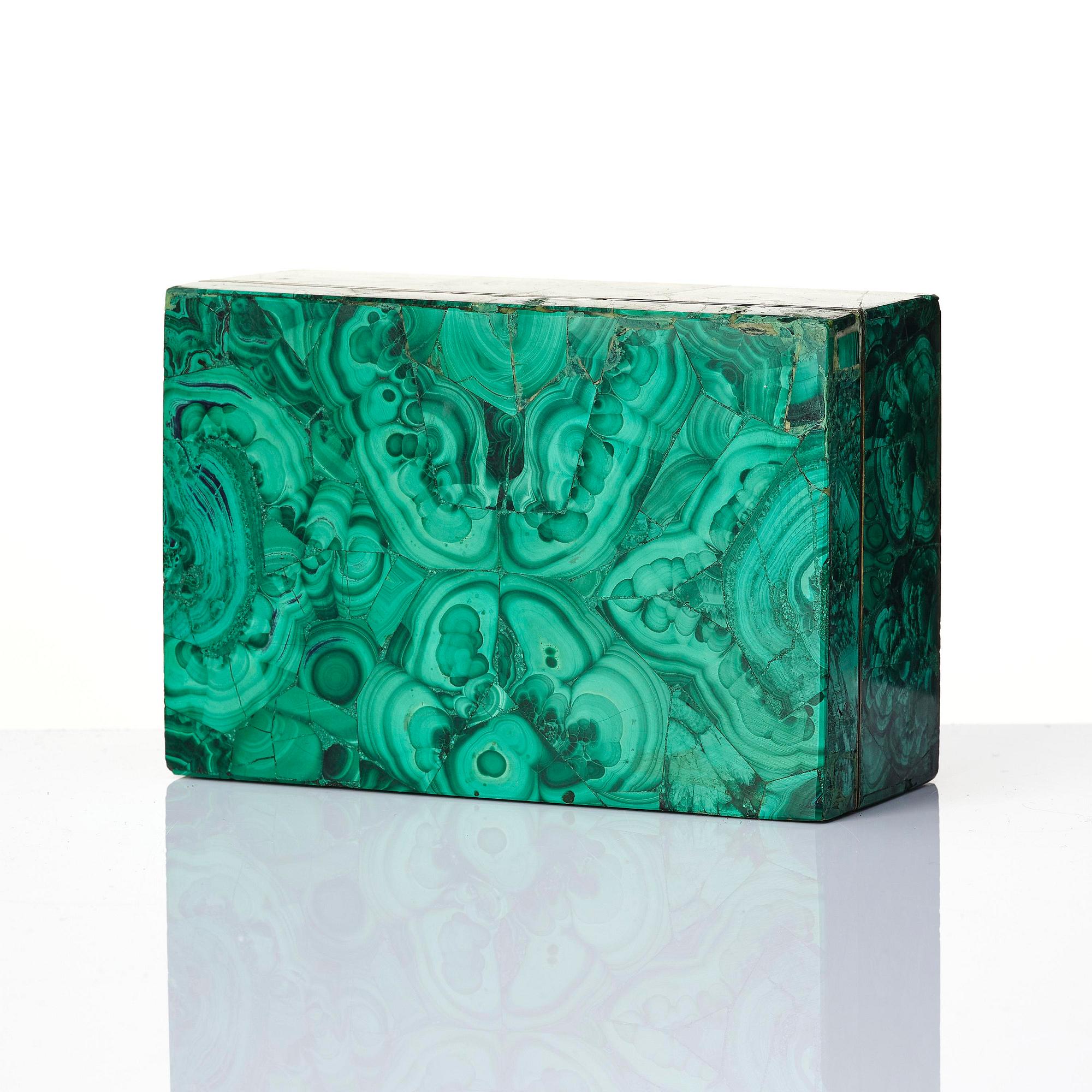 A Russian Nicholas II malachite-veneered box, circa 1900.