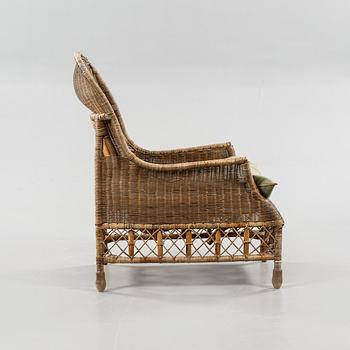 A rattan arm chair from the second half of the 20th century.