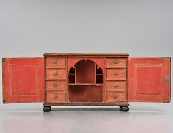 A Swedish polychrome-painted baroque cupboard, late 17th century / circa 1700.