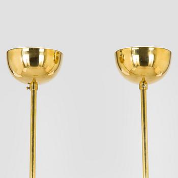 Paavo Tynell, a pair of mid 20th century ceiling lights, model 1699, for Taito / Idman.