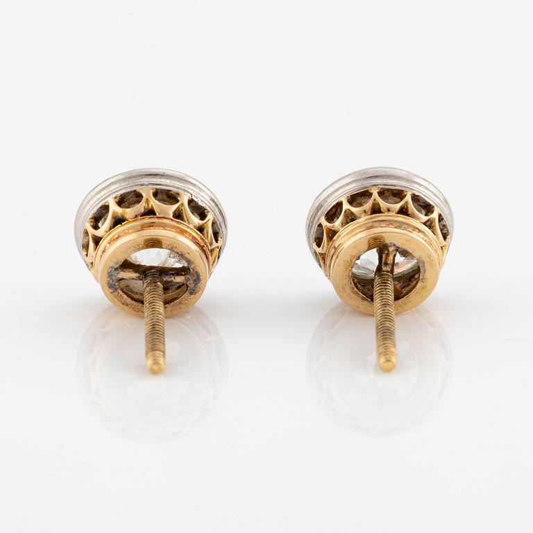 A pair of earrings in gold with old-cut diamonds.