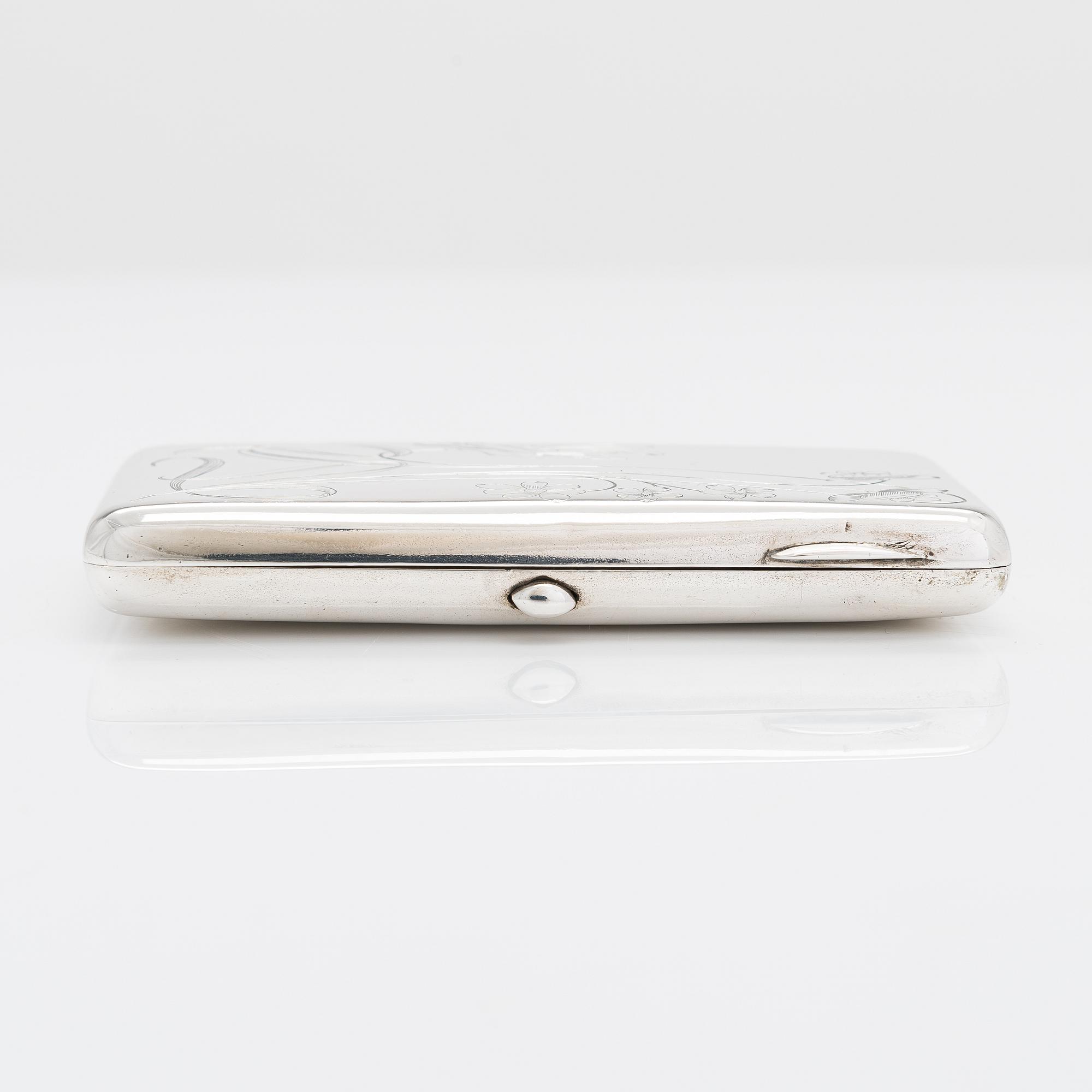 A silver cigarette case, maker's mark of Vasili Sikazev, Moscow 1908-17.