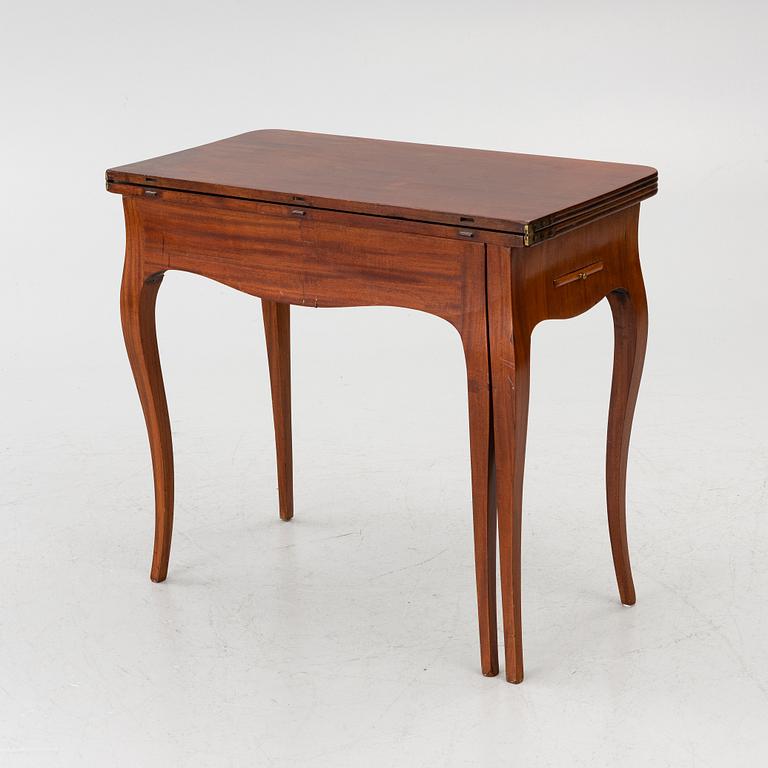 A Rococo game table, 18th century.