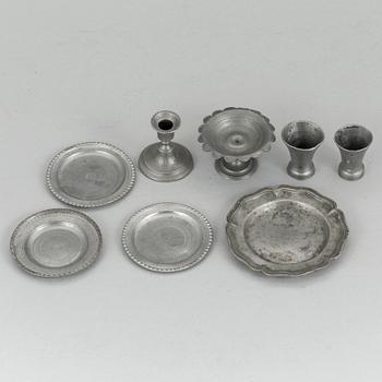 A lot of eight pewter doll house accessories 19th century.