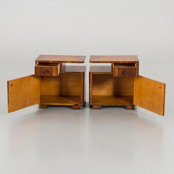 A PAIR OF MID 20TH CENTURY BEDSIDE TABLES.