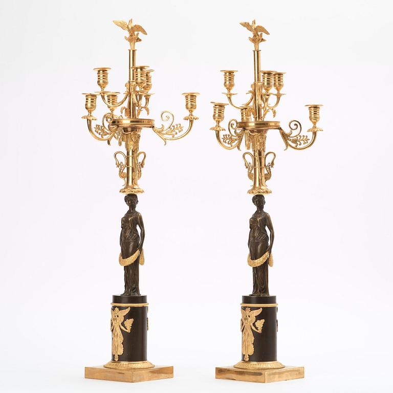 A pair of Empire early 19th century six-light candelabra.
