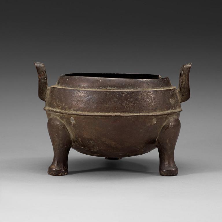 A bronze tripod censer, presumably Han dynasty (206 B.C-220 A.D).