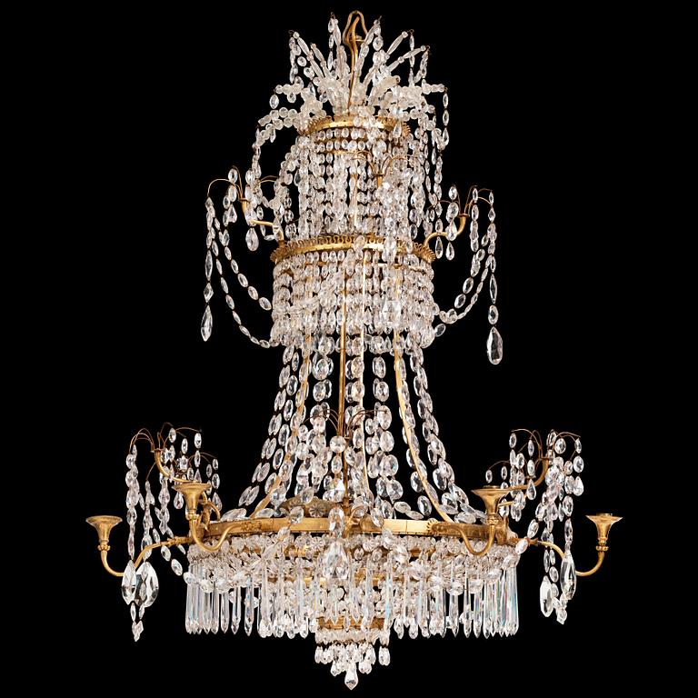 A German Louis XVI gilt-brass and cut-glass six-light chandelier, late 18th century.