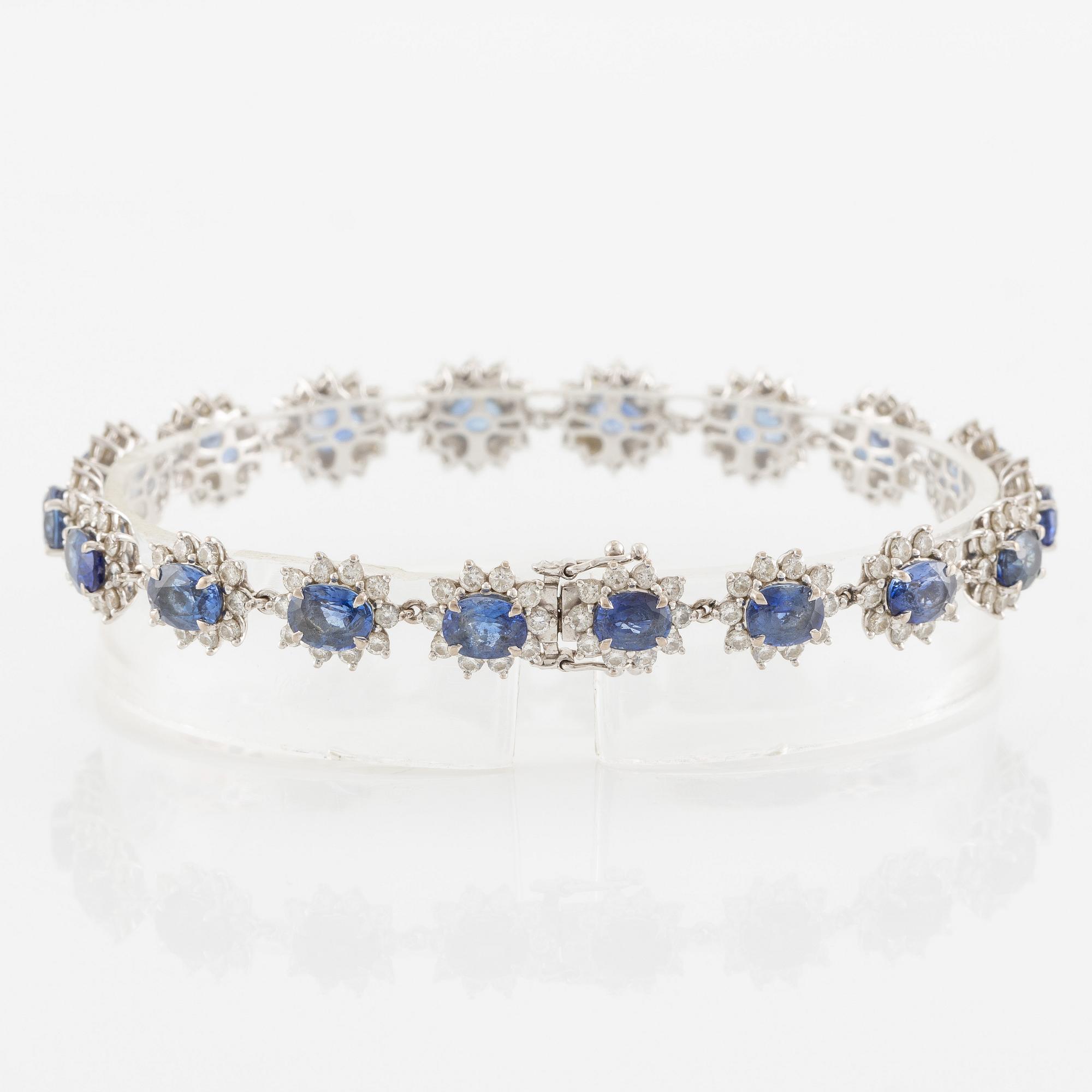 Bracelet 18K white gold with step-cut sapphires and round brilliant-cut diamonds.