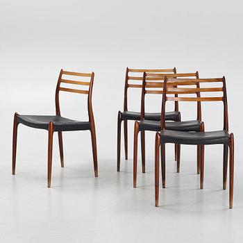 Niles Otto Møller, a rosewood veneered table with four chairs, JL Møller, Denmark, 1950's/60's.
