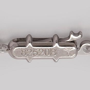 Cartier, an 18K white gold '1895' necklace with a brilliant-cut diamond.