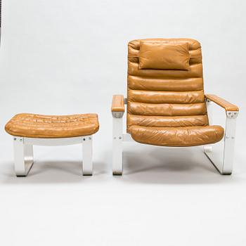 ILMARI LAPPALAINEN, a pair of 'Pulkka' lounge chairs with ottomans for , Asko, Finland.