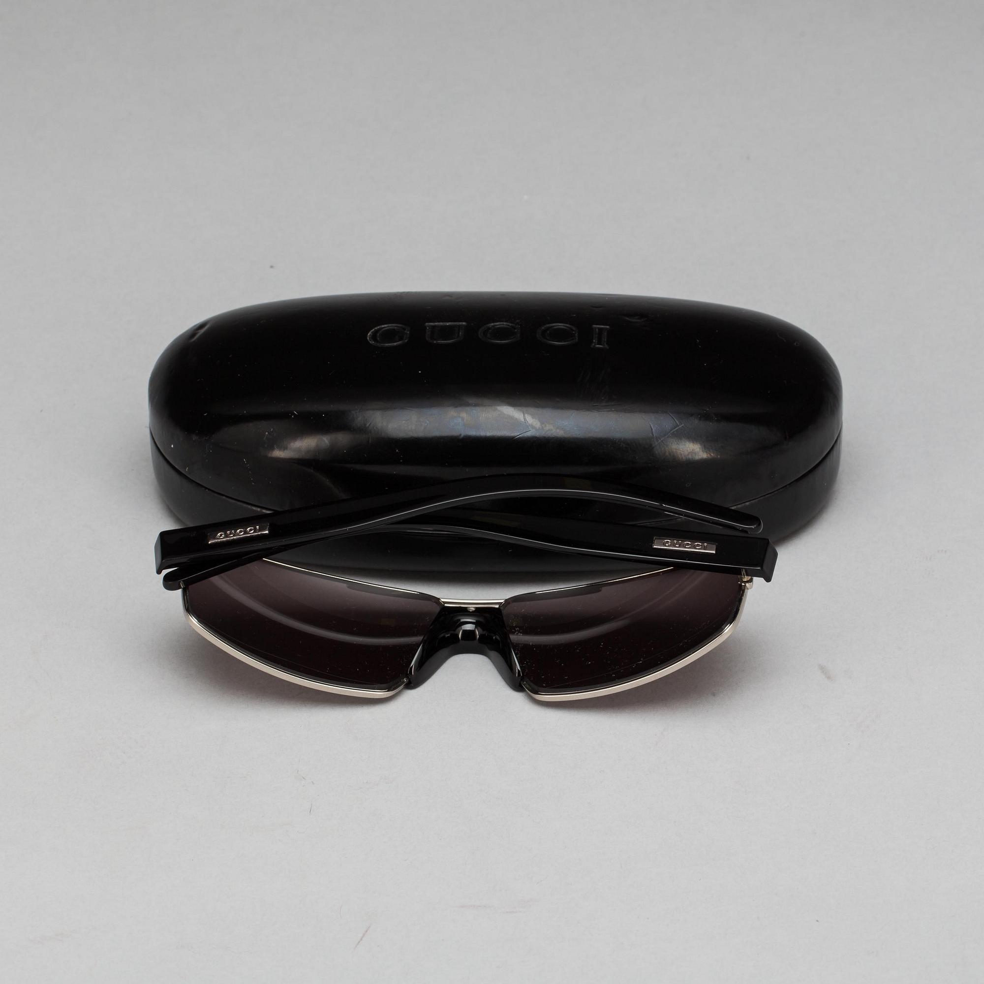SOLGLASÖGON, Gucci.
