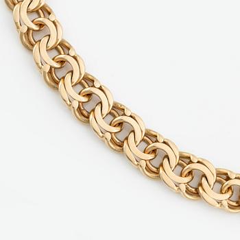 Necklace, 18K gold, graduated Bismarck link.