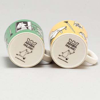 Two porcelain Moomin mugs, Moomin Characters/Bulls, Arabia, Finland.